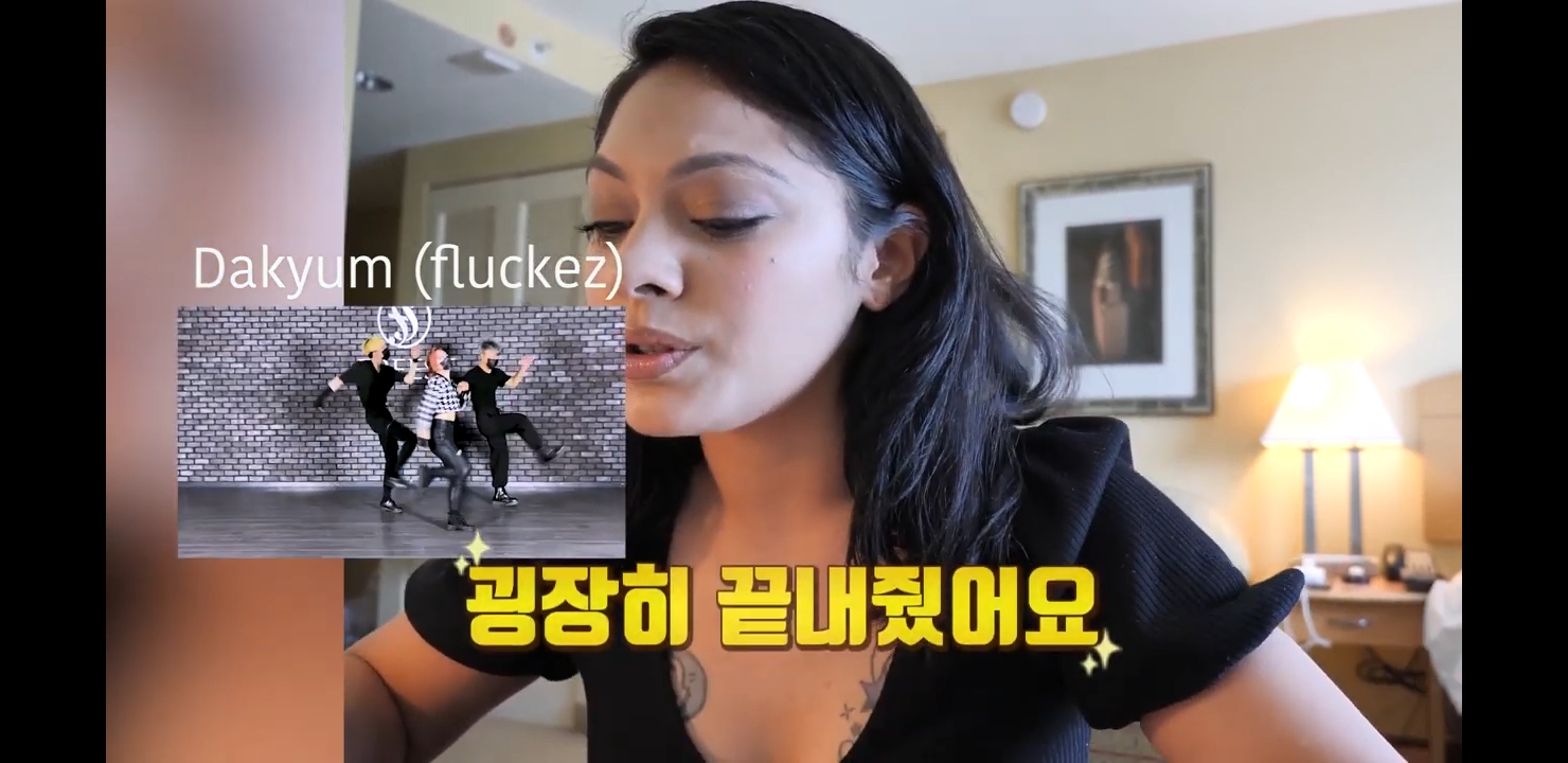 screencap of Layla Khepri reaction video to a Korean dance video to her song Merchy